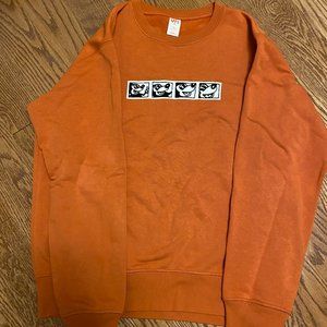 orange mickey mouse sweatshirt